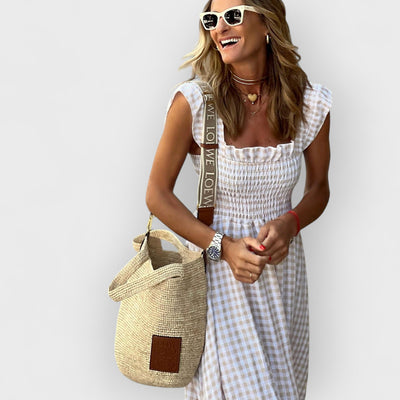 Ríona – Smocked Maxi Dress with Ruffled Sleeves